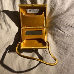 Barney’s New York vintage gold tiny wristlet